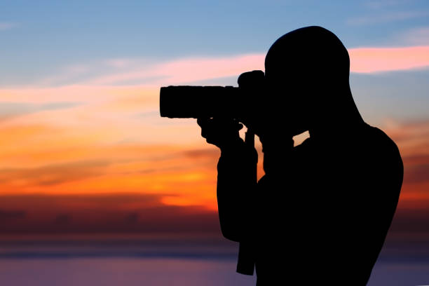 istock Photographer taking pictures 821884964