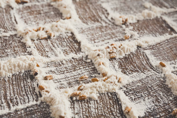 istock Baking concept on wood background, sprinkled flour with copy spa 821885150