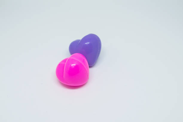 istock Pink plastic heart with purple Lay on a beautiful white background. 821889294