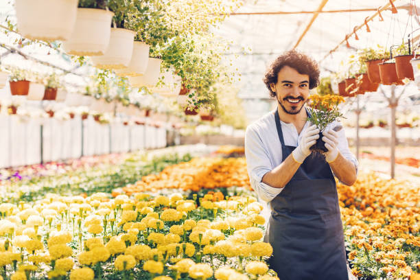 istock Happy garden center owner 821889402