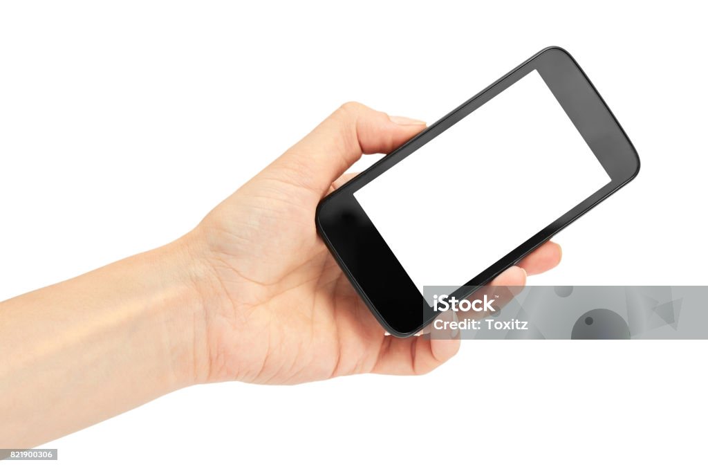 Female hands hold a cell phone, mockup template. Isolated on white background Gripping Stock Photo