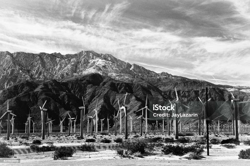 Wind Turbines, clean energy production near Palm Springs, California, USA Wind Turbines, commonly called windmills, are seen in the San Gorgonio Wind Park, the oldest wind farm in the United States. It lies within the Coachella Valley near Palm Springs, Southern California, Western USA. Black And White Stock Photo