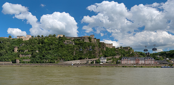 Koblenz, Germany - June 18, 2012: Ehrenbreitstein Fortress on the east bank of the Rhine. It was built between 1817 and 1828. The fortress is connected to the town of Koblenz across the Rhine by a cable car that was put into operation on July 4, 2010.