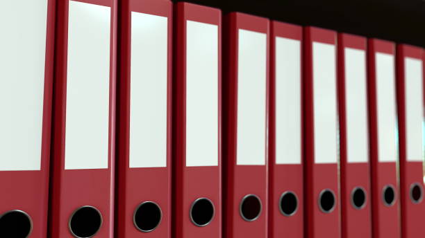 istock Line of red office binders. 3D rendering 821913258