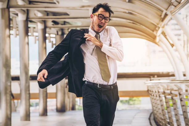 istock Rushing businessman running or racing with time 821915812
