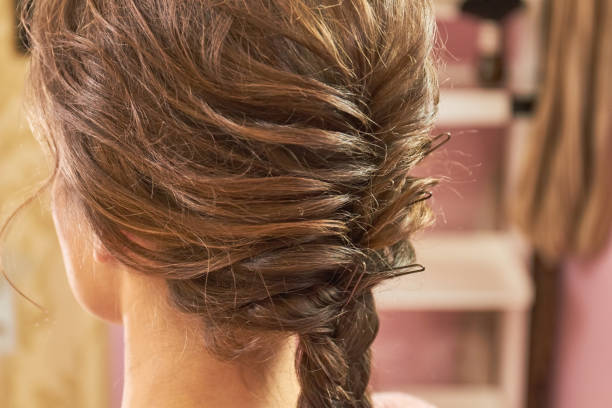 istock Braided female hairdo close up. 821918520