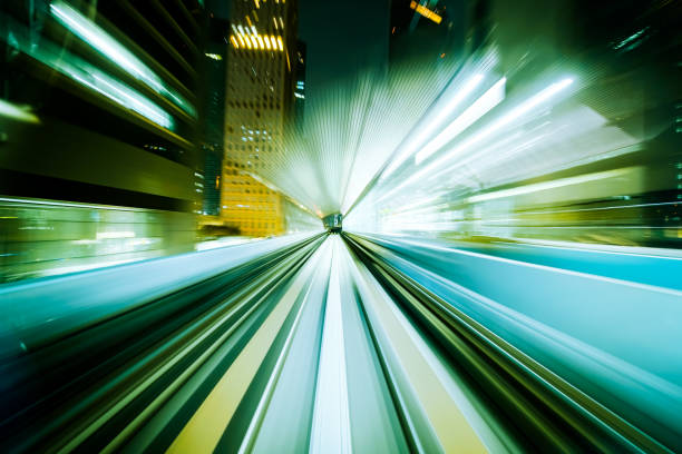 istock Motion blur train moving in city rail tunnel. 821918978