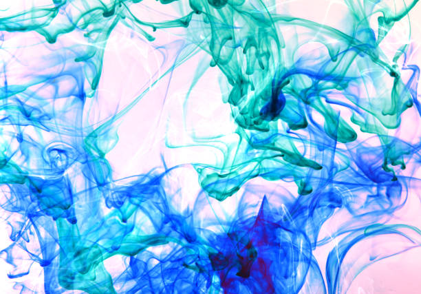 istock Cloud of colorful inks in water isolated. 821923128