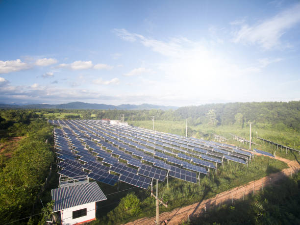 Solar panels (solar cell) in solar farm to create the clean electric power. stock photo