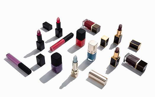 Lipsticks,lipgloss, foundations and nail polishes isolated on white background( with clipping path)