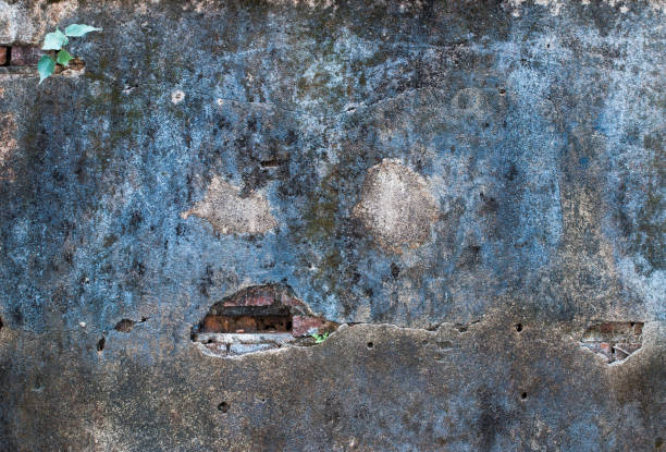istock cracked concrete vintage brick wall background 821945734