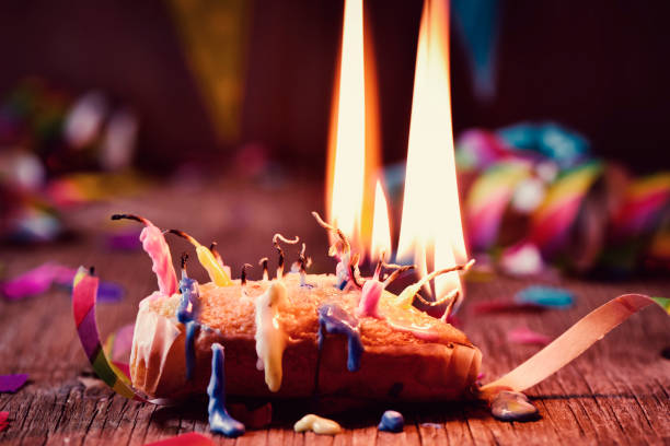 blowing out the candles of a cake