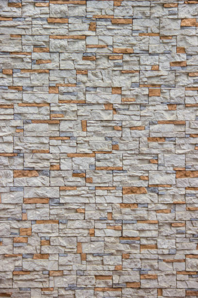 istock Orange and gray stone in masonry 821951530