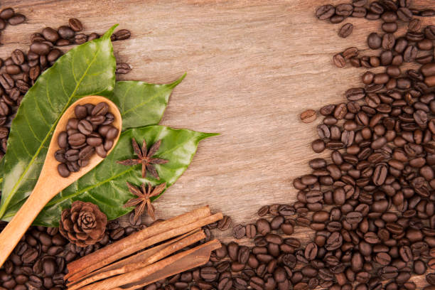 Coffee beans on grunge wooden background stock photo