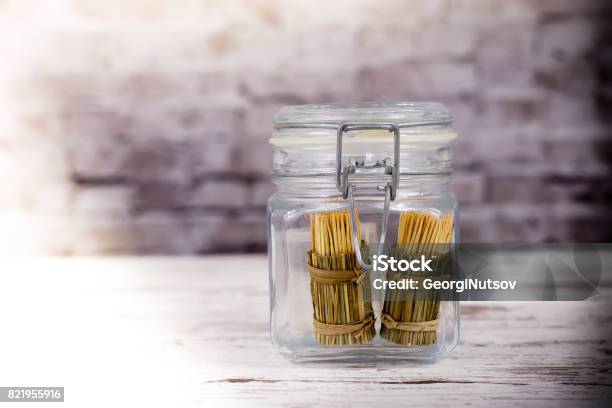 Exotic Wrapped Toothpicks In A Glass Jar Of Spices Stock Photo - Download Image Now