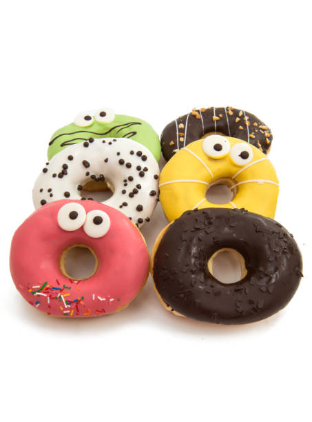 istock delicious donuts in color glaze isolated 821973004