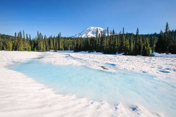 istock Mount Rainier from a snow-covered Reflection Lake 821986338