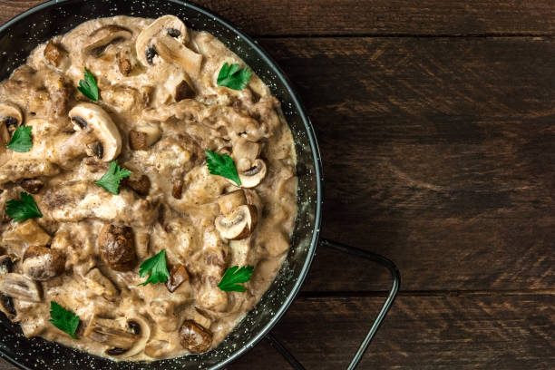 istock Mushroom beef stroganoff in pan with copy space 821987632