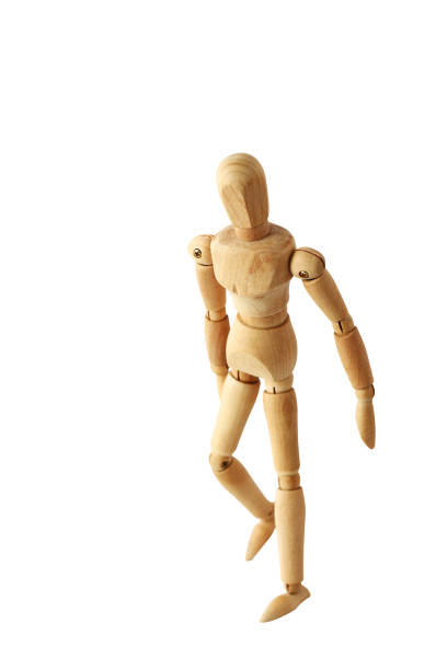 istock wooden puppet action in white isolated with path 821988472