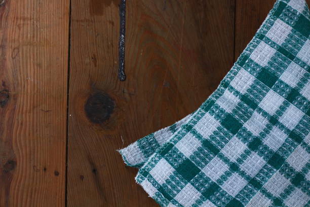 istock wood floor and green napery on top view 821996040