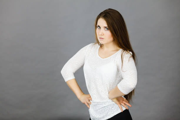 istock Attractive woman having angry frustrated face expression 821997016