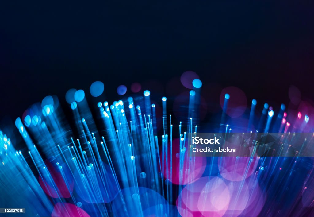 Fiber Optic Background Fiber optics close-up, focal point on distant fibres Fiber Optic Stock Photo