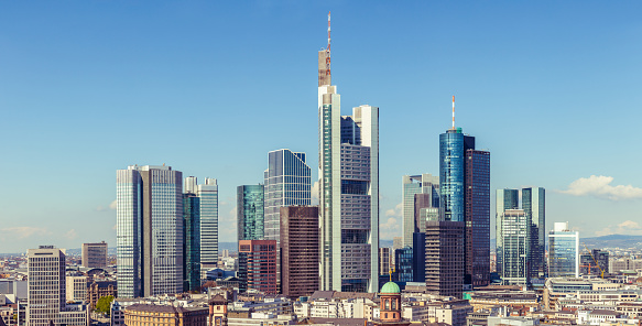 Frankfurt skyline aerial view on a sunny day. Panoramic view of city downtown with skyscrapers and buildings. Travel and architecture concepts