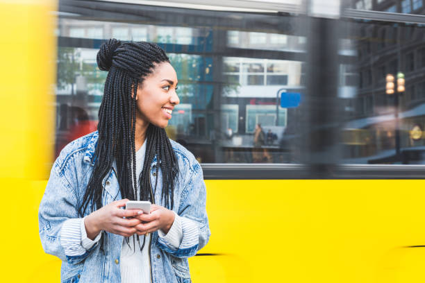 istock Black girl typing on smartphone in Berlin 822032886
