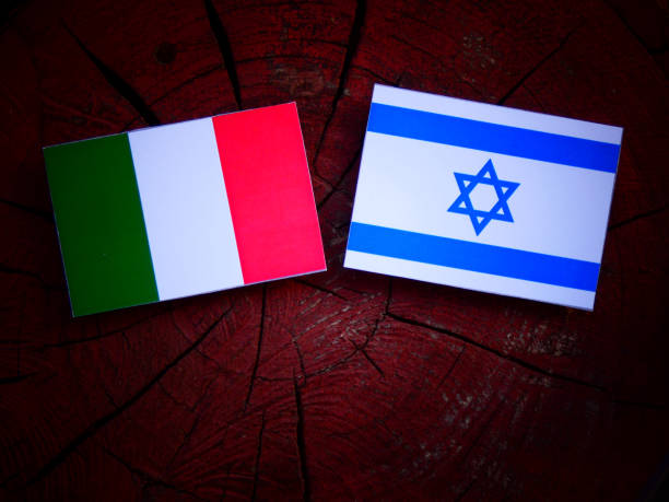 istock Italian flag with Israeli flag on a tree stump isolated 822034384