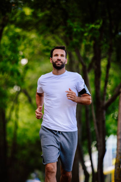 istock Hansome sportsman running in nature 822043544