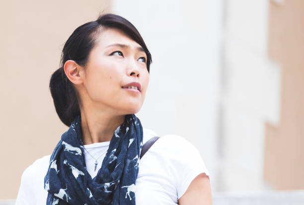 istock Japanese woman looking to the future 822060706