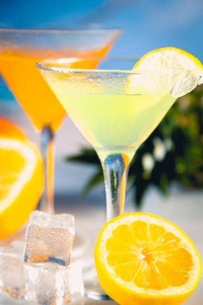istock Colorful summer background with drink and palms 822070780