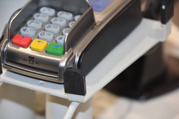 istock credit card machine in the store 822077056