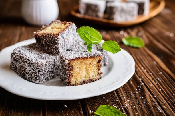 istock Lamington cakes with chocolate and coconut coating 822081100
