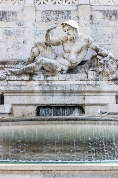 istock sculpture in water fountain in Piazza Venezia 822082448