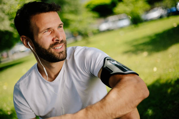istock Man listening to music in nature 822097736