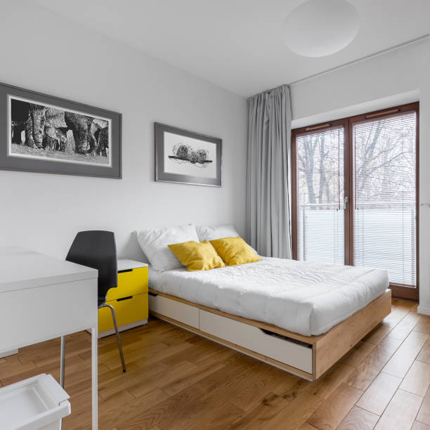 istock White bedroom with bed and desk 822101164