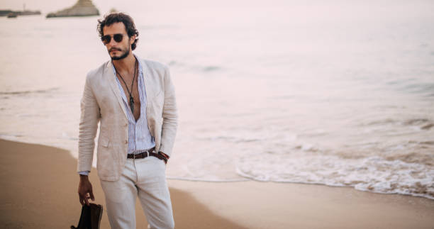 istock Enjoying a walk on the beach 822106424