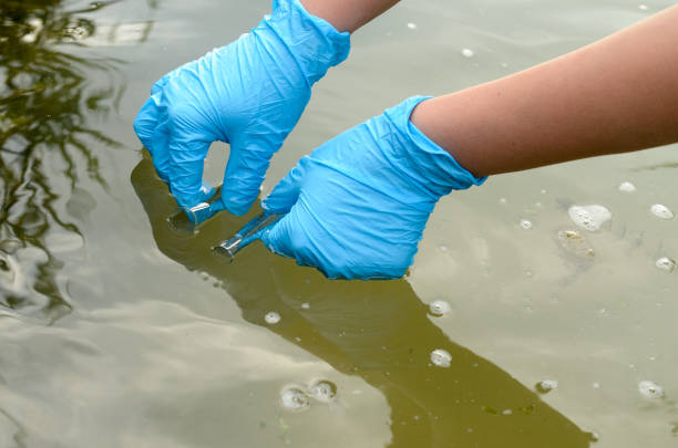 istock Taking a water test for analysis from a reservoir. 822112192