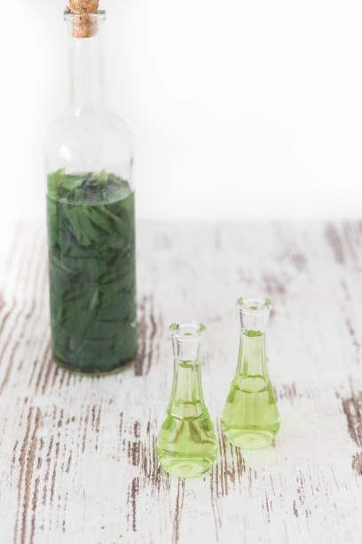 istock Herbal brandy with healty leafs and lime 822123424