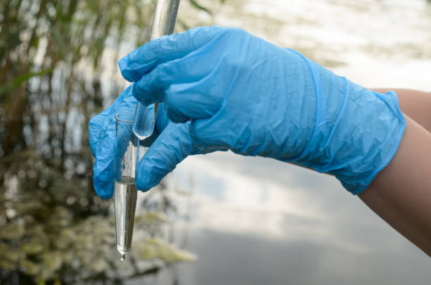 istock Taking a water test for analysis from a reservoir. 822123978