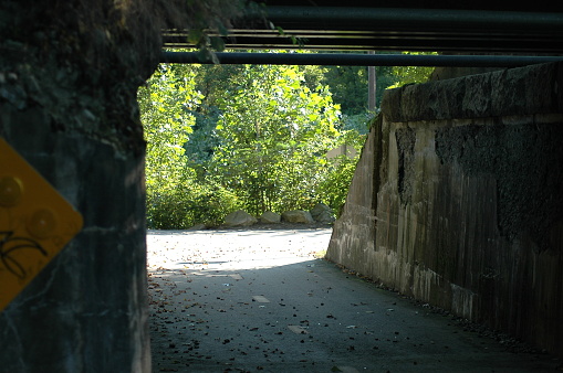Old underpass beneath railroad tracks along Blackstone River Bikeway
