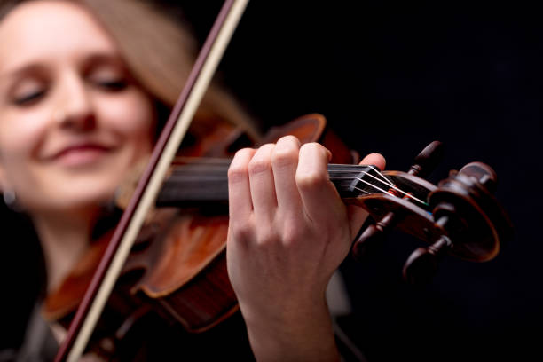 istock hand closeup of a violinist classical musician 822173430