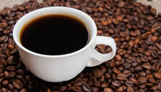 istock cup of coffee standing on the grains 822179376