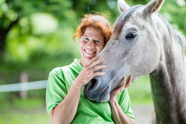 istock Veterinarian smiling with horse 822213490
