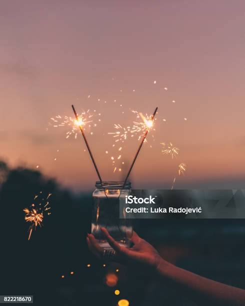 Sparklers Stock Photo - Download Image Now - Sparkler - Firework, Jar, Hand