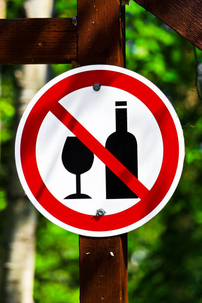 istock A circular no alcohol sign on a post 822218710