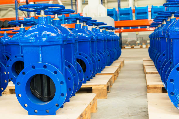 istock New water pipelines with valve on plant`s stock. 822256682