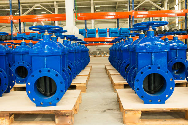 istock New water pipelines with valve on plant`s stock. 822256694
