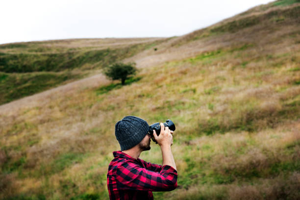 istock Man Photography Camera Nature Environment Concept 822257582